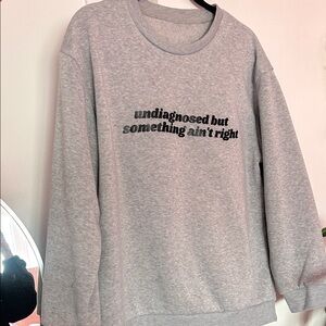 Gray Crewneck Sweatshirt with Black Text